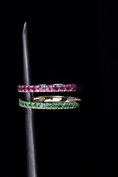 Handcrafted 18ct White Gold band half set with Rubies.