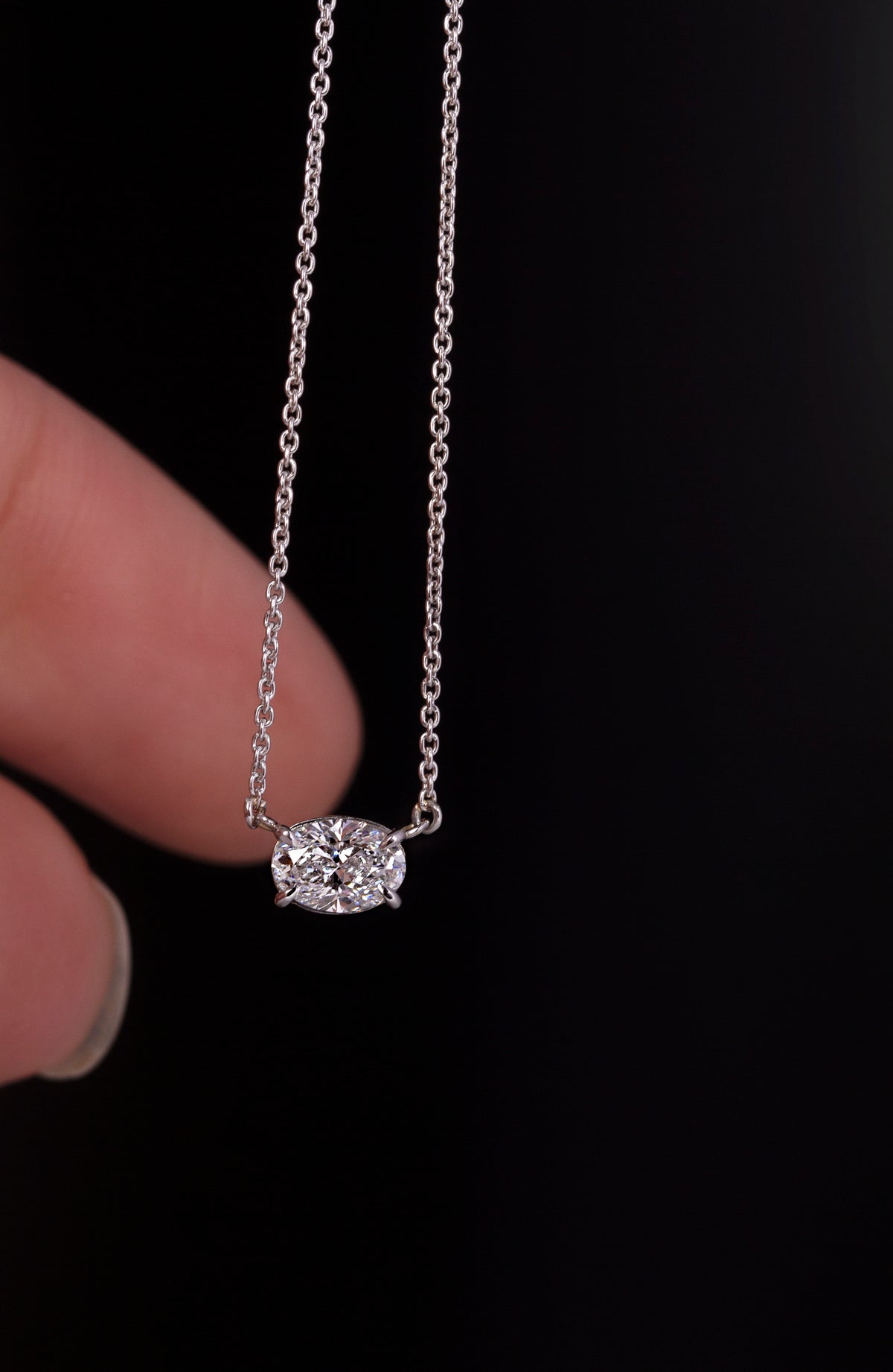 Platinum Oval Diamond pendent in an East-West setting