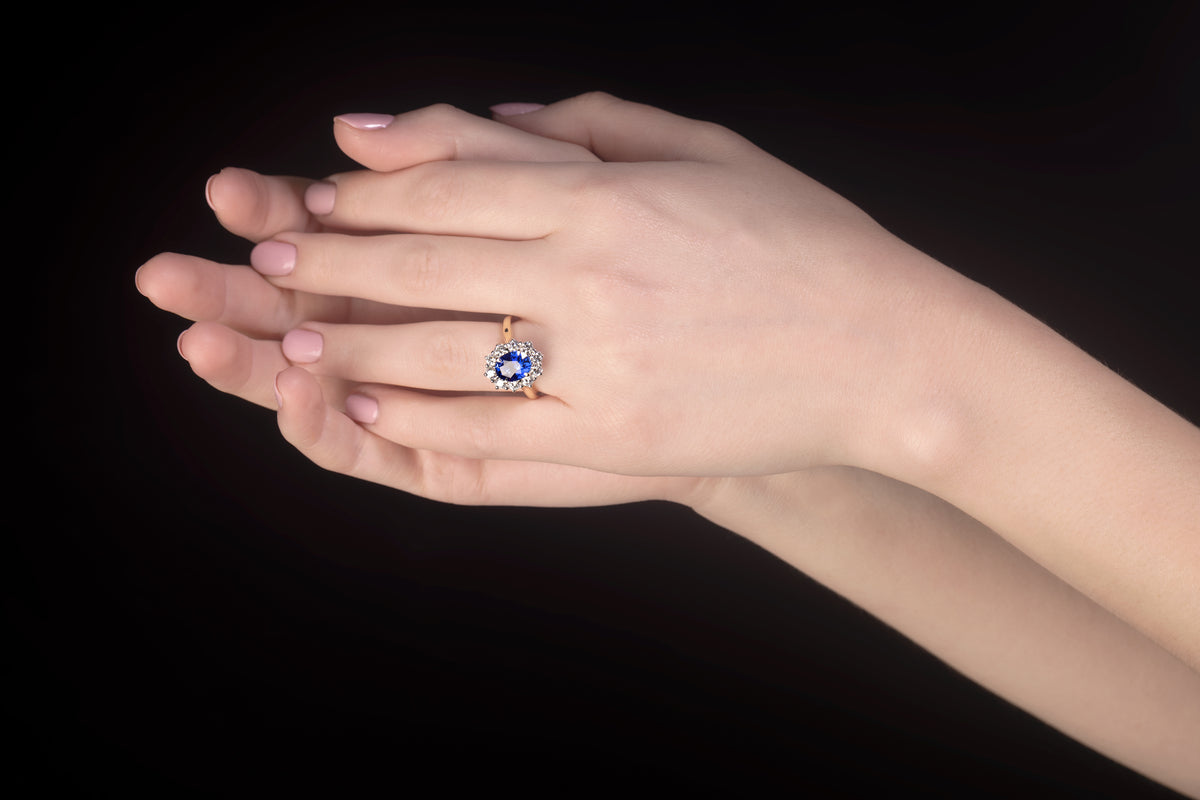 Custom 2.31ct Oval cut Blue Ceylon-type Sapphire and Diamond halo ring